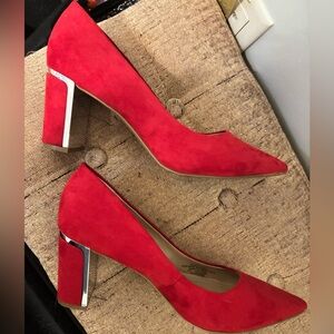 Red black Heels w/ a metallic finish